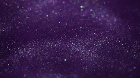 Blur sequins. Ink fluid. Violet particles flow spill shiny pigment in water. Sparkling abstract cosmic cloud explosion glare background. - Powered by Shutterstock - Get 15% off with code: PIKWIZARD15
