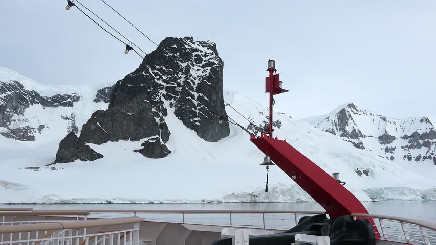 Exploring icy landscapes and majestic cliffs in Antarctica on an expedition ship