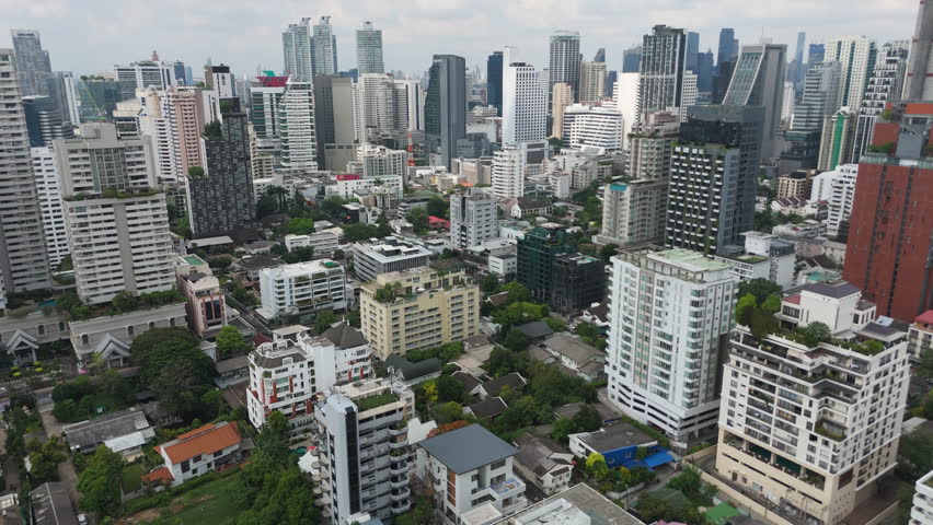 Aerial View Of Bangkok City With Towering Condos, Hotels And Corporate Offices In Thailand.