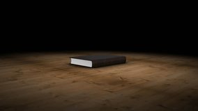 Top view open black hardcover book on wooden floor with green screen pages paper and tracking marks. chroma key template for adding custom content, mock up digital design or presentation. transition - Powered by Shutterstock - Get 15% off with code: PIKWIZARD15