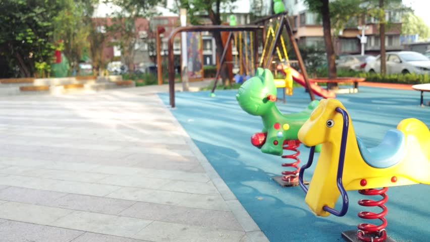 Empty children playground in China during quarantine by reason of coronavirus AKA covid-19 virus threat. State of emergency