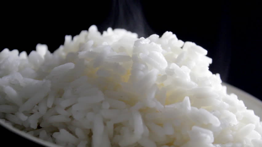 Cooked rice steaming