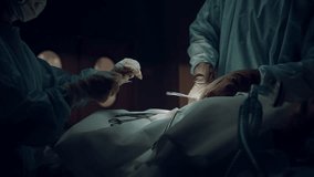 Medical Team Performing Complex Surgery on Patient, Using Specialized Tools. Doctors man woman Surgeon in Lead Saving Patient's Life. Operation Under Bright Surgical Lights in Modern Hospital clinic - Powered by Shutterstock - Get 15% off with code: PIKWIZARD15