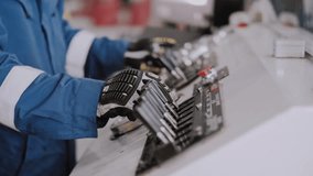 Control panel operation. Gloved hands press the control levers. - Powered by Shutterstock - Get 15% off with code: PIKWIZARD15