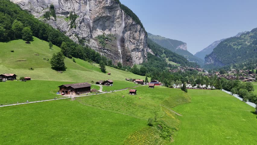 Lauterbrunnen green Valley Switzerland ascending drone,aerial