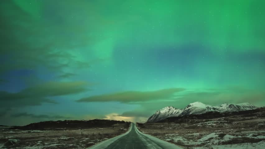 Lofoten Norway time lapse of the aurora borealis northern lights winter landscape at E10 road in Grundstad