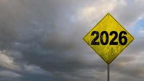 New year 2026 or straight forward concept. Text 2025 to 2026 road sign with time lapse clouds moving in 4K. Concept of planning, goal, challenge, new year resolution and start. - Powered by Shutterstock - Get 15% off with code: PIKWIZARD15