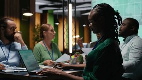 Diverse administrative team attending briefing conference at night to verify updates on regulatory changes or industry standards. Business professionals reviewing all data analysis. Camera A. - Powered by Shutterstock - Get 15% off with code: PIKWIZARD15