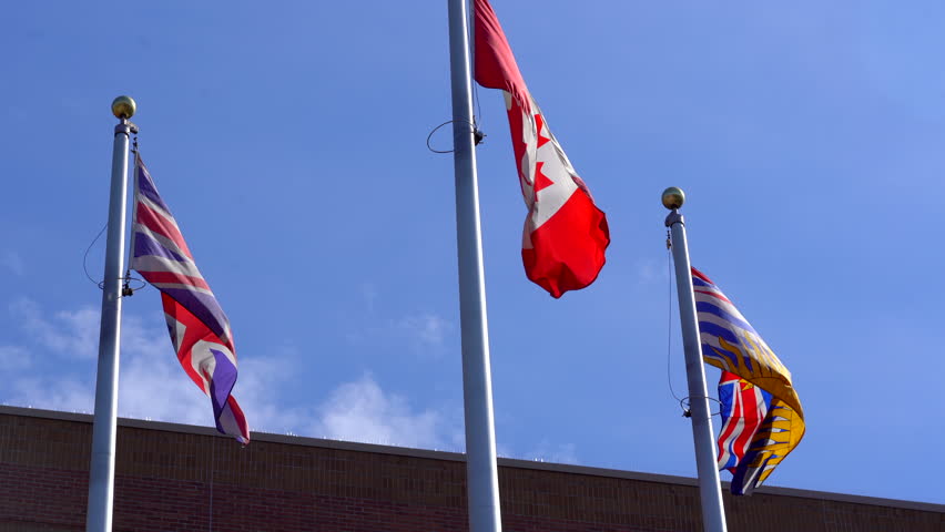 Canadian flag with British Columbia Flag and British flag