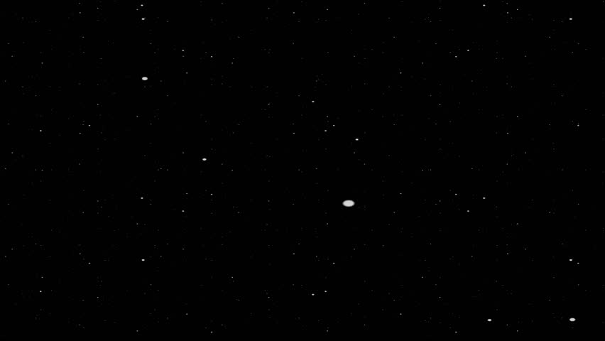 A minimalist black background with subtle, scattered white particles, creating a serene and spacious cosmic feel.
