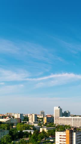 Vertical video. Ulyanovsk, Russia. Nightfall after sunset. After the night the sun rises. In the morning It rains. Panorama of the city. View of the Volga River, TimeLapse