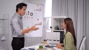 Focused Asian adult woman professional utilizes mobile device for business communication in modern office environment ensuring digital work efficiency - Powered by Shutterstock - Get 15% off with code: PIKWIZARD15