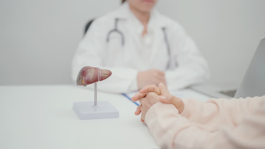 Doctor with human Liver anatomy. Elderly Patient consultation medical health for Liver cancer and Tumor, Jaundice, Viral Hepatitis, Cirrhosis, Failure, Enlarged, Hepatic Encephalopathy, Ascites Fluid 