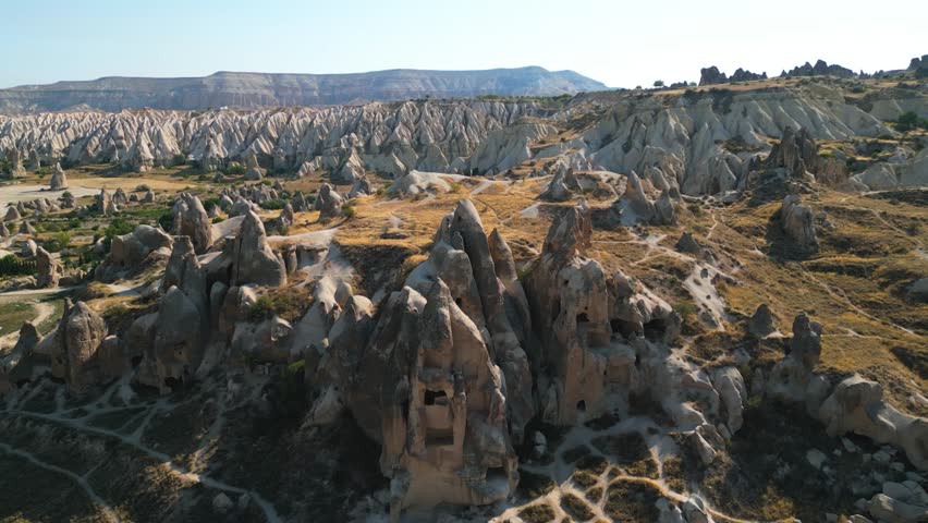 4K Stunning aerial footage of Göreme, a historic town nestled among Cappadocia’s iconic fairy chimneys. This drone video showcases the traditional stone houses. Cappadocia - Turkey_15