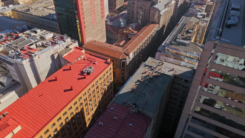 establishing shot of antique architecture buildings on thr streets of Santiago