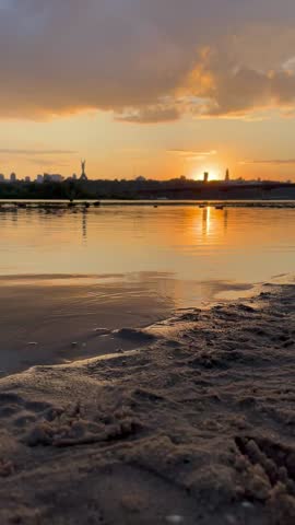 on the beach at sunset, Dnipro River, Kyiv, Ukraine