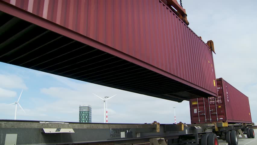 Cargo loading at Rotterdam port, showcasing industrial activity