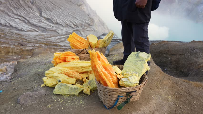 Pieces of Freshly Mined Sulfur Extracted by Hand from Ijen Crater
