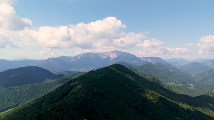 Cinematic Drone Flight Over Wild Alpine Landscapes in Austria. Top Cinematic Aerial View. Wild nature and landscape from above