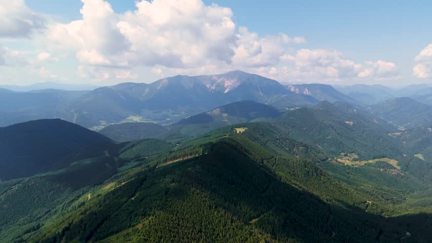Cinematic Drone Flight Over Wild Alpine Landscapes in Austria. Top Cinematic Aerial View. Wild nature and landscape from above