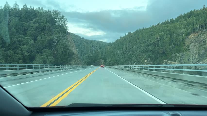 POV shot from a moving vehicle on the Redwood Highway near Humbolt County in Northern California. 4K