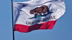 California State Flag Waving on Pole on Sunny Day, Close Up Slow Motion - Powered by Shutterstock - Get 15% off with code: PIKWIZARD15