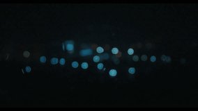 Thunderstorm with rain in a city as seen through the window - Powered by Shutterstock - Get 15% off with code: PIKWIZARD15