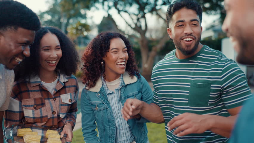 Friends, laughing and happy man with women in backyard for celebration, social event and gossip. Bonding, party and conversation with funny people in garden for summer, reunion and speaking together