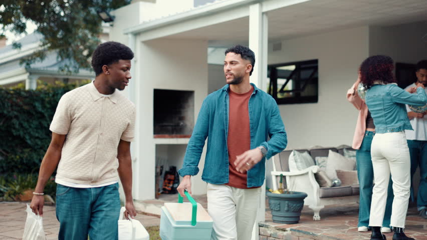 Smile, men and friends with cooler box at house for barbecue, celebration and New years party. People, talking and walk with BBQ equipment, lunch reunion and prepare for social gathering in backyard
