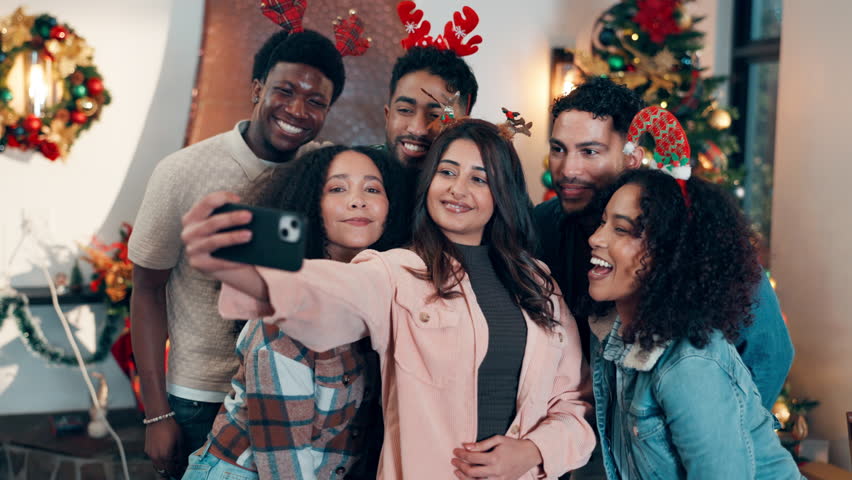 Peace sign, smile and friends with selfie for Christmas celebration, festive reunion and social media post. Group, people and photography for bonding with xmas, profile picture and memory at house