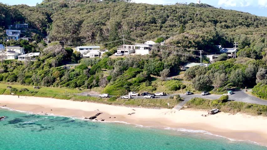 Drone footage of the beach at Seal Rocks and the Sugarloaf Point Lighthouse