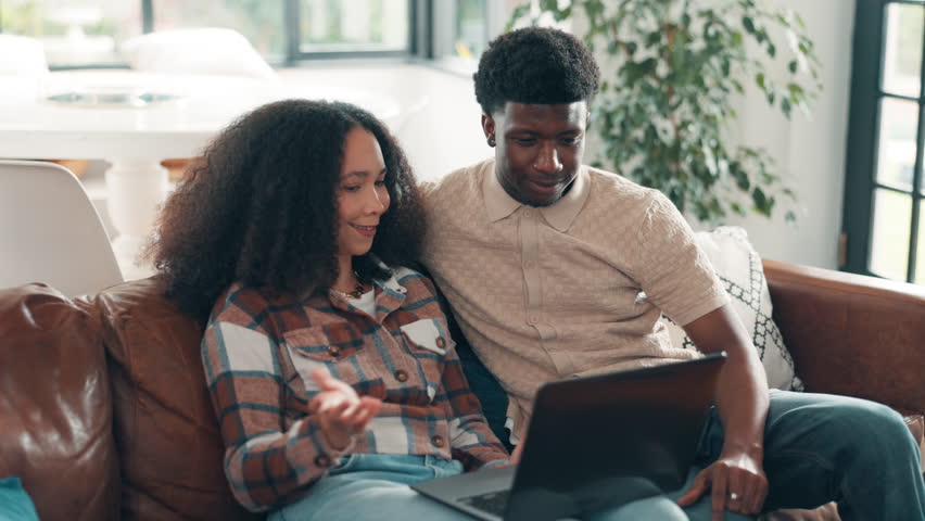Laughing, couple and bonding with laptop, home or browsing for comedy movies on web or subscription. Happy, man and woman with tech for entertainment, African and choice on streaming site in lounge
