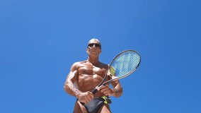 A man practicing tennis outdoors - Powered by Shutterstock - Get 15% off with code: PIKWIZARD15