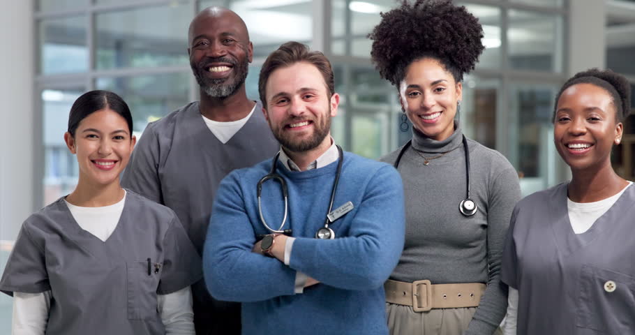 Face, medical team and people in hospital, healthcare and about us with career ambition, pride and smile. Portrait, men and women in clinic, diversity and commitment with service, help and unity