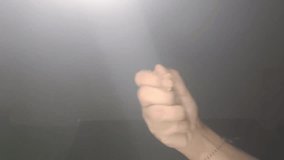 White rice grains falling from an open hand in mid-air, cascading gently downward like rain, each grain catching soft light as it moves - Powered by Shutterstock - Get 15% off with code: PIKWIZARD15