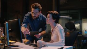 Business man woman cooperation in night office trader broker working computer stock market analysis bitcoin trading online crypto currency businessman businesswoman co-workers teamwork mentor intern - Powered by Shutterstock - Get 15% off with code: PIKWIZARD15