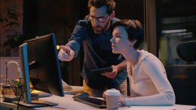 Business man going in night office woman employee argue discuss corporate project online work computer problem businessman businesswoman disagreement conflict co-workers colleagues misunderstanding - Powered by Shutterstock - Get 15% off with code: PIKWIZARD15