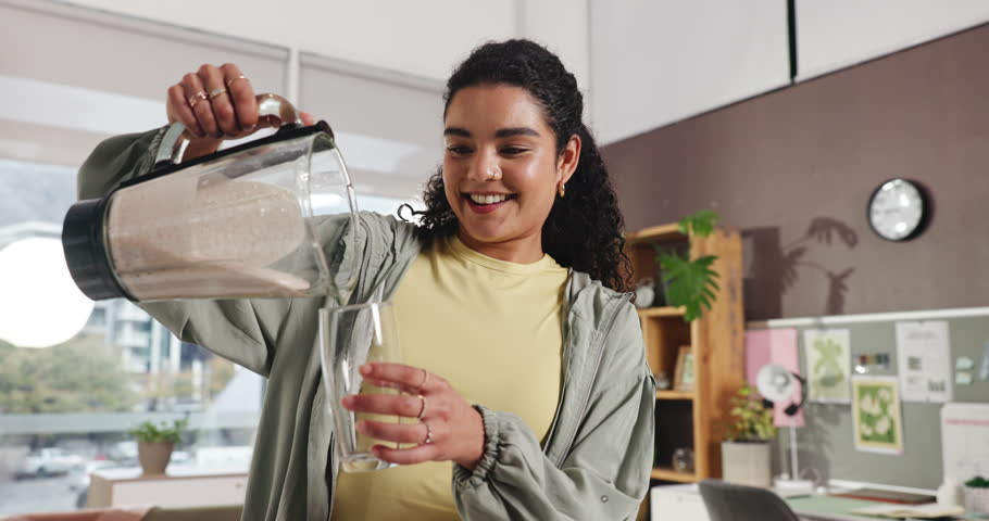 Woman, blender and pour smoothie in kitchen with glass, nutrition or excited for wellness at house. Person, machine and liquid diet with drink, milkshake and happy for detox for gut health at home