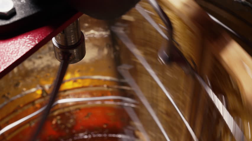 Honey Manual Extracting In Metal Barrel Centrifuge. Frames Rotating, Apiarist
