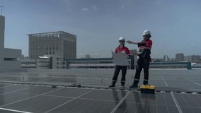 Skilled technicians examining rooftop layout while installing solar panels ensure sustainable energy solutions and efficient technology for future renewable energy systems - Powered by Shutterstock - Get 15% off with code: PIKWIZARD15