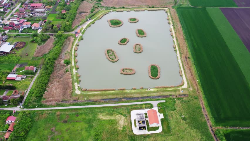 Exploring a Serene Natural Landscape with Islands in the Middle of a Tranquil Lake