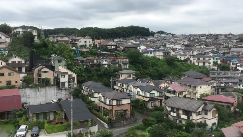 Residential area, Japan, train window view, houses passing by, urban landscape