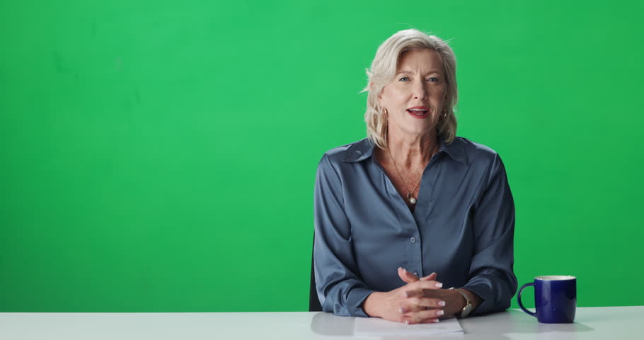 Face, woman and journalist with breaking news, green screen or national update, talk or information. Tv, reporter and mature person with announcement for public, mockup space and anchor in studio
