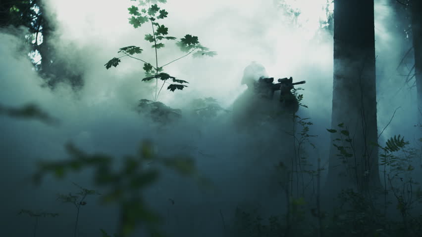 Fully Equipped Soldiers Wearing Camouflage Uniform Attacking Enemy, Rifles Ready to Shoot. Military Operation in Action, Squad Running in Formation Through Dense Smokey Forest.