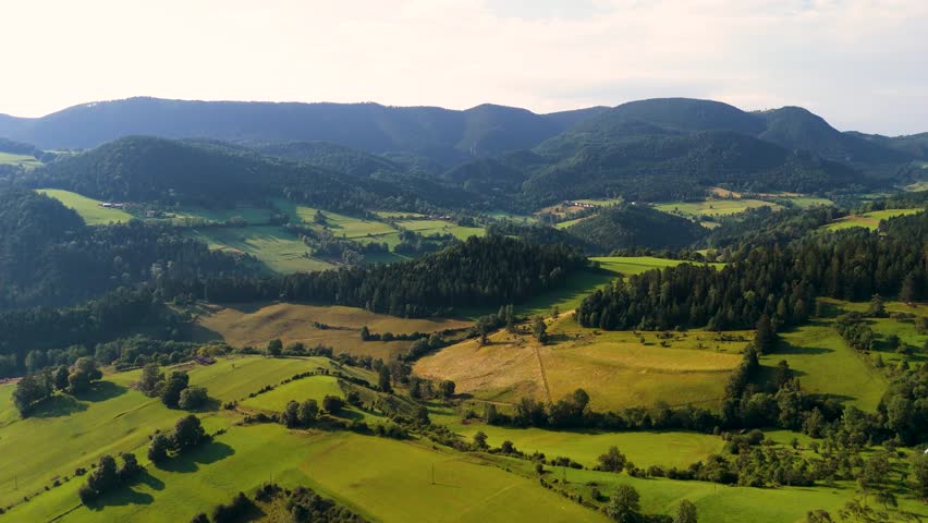 Cinematic Drone Flight Over Wild Alpine Landscapes in Austria. Top Cinematic Aerial View. Wild nature and landscape from above
