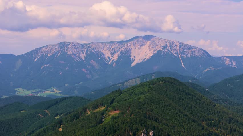 Cinematic Drone Flight Over Wild Alpine Landscapes in Austria. Top Cinematic Aerial View. Wild nature and landscape from above