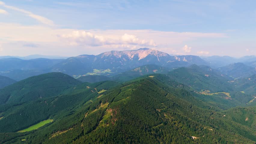 Cinematic Drone Flight Over Wild Alpine Landscapes in Austria. Top Cinematic Aerial View. Wild nature and landscape from above