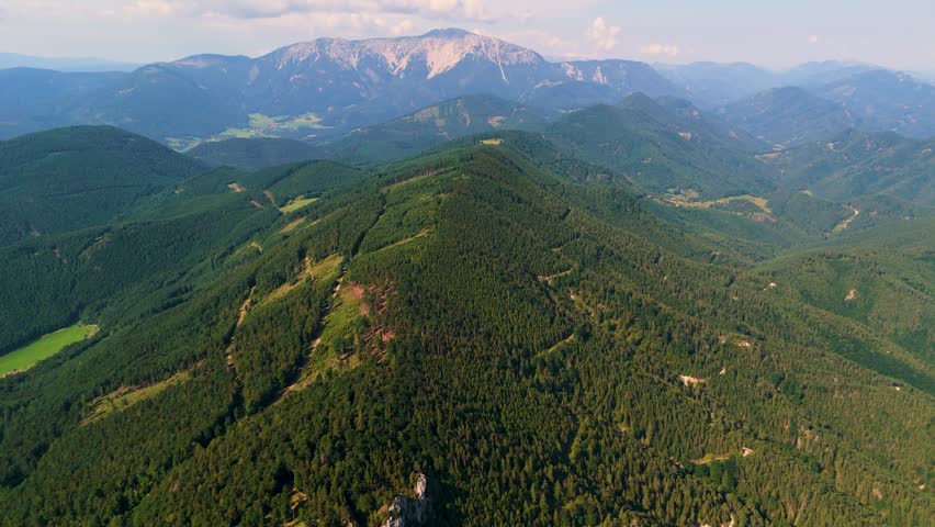 Cinematic Drone Flight Over Wild Alpine Landscapes in Austria. Top Cinematic Aerial View. Wild nature and landscape from above