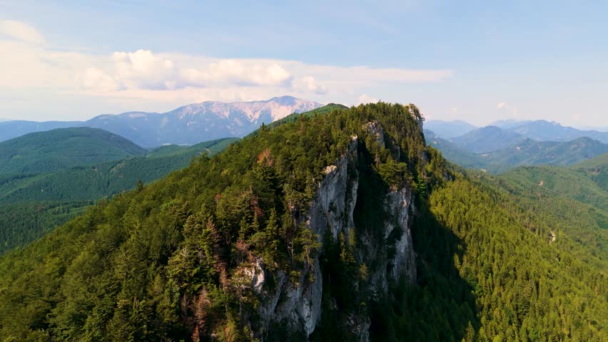 Cinematic Drone Flight Over Wild Alpine Landscapes in Austria. Top Cinematic Aerial View. Wild nature and landscape from above