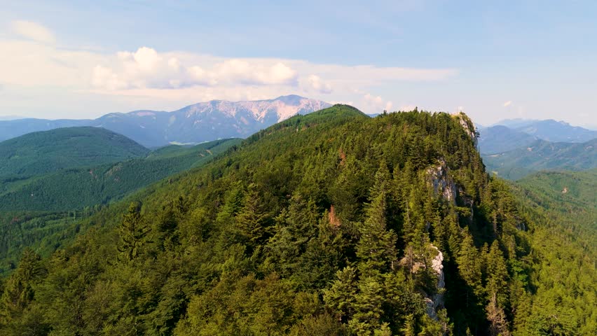 Cinematic Drone Flight Over Wild Alpine Landscapes in Austria. Top Cinematic Aerial View. Wild nature and landscape from above